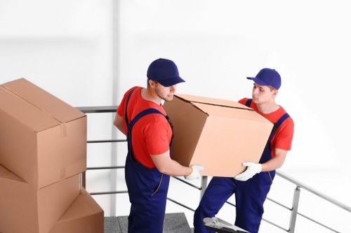 Removal team loading furniture during a same day move