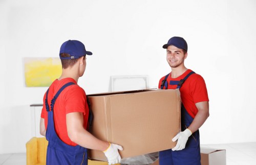 Professional movers packing and loading household items in Richmond