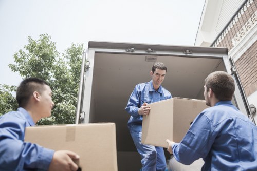 Removal team planning a flat move near Richmond apartment buildings