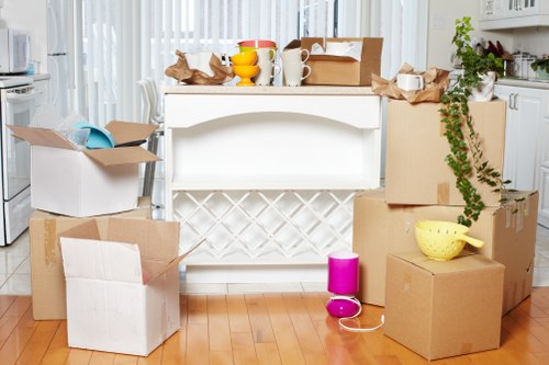 Local movers handling desks and boxes during a Richmond relocation