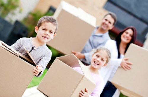 Professional Movers Richmond handling boxes during a local relocation