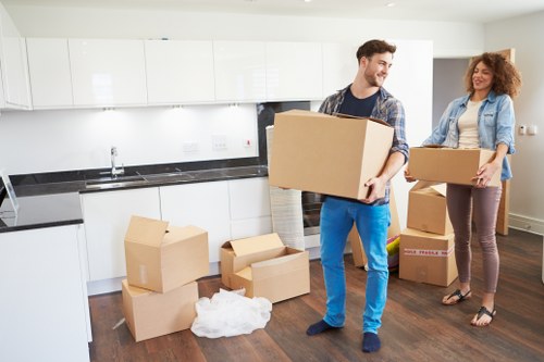 Careful loading of household furniture into a removal vehicle