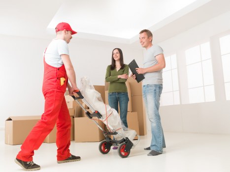Careful handling of boxes and furniture in a Richmond property