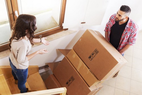 Movers in Richmond loading items into a moving truck carefully
