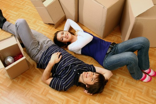 Team loading sofas and chairs for furniture collection in Richmond